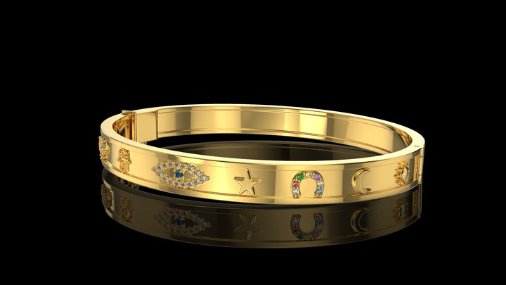 Yellow gold charm bangle